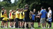 Coach speaking at a University of Bath Training Camp