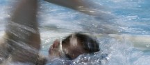 Swimming Training - a swimmer in action in the 50m pool
