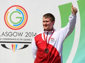 Kristian Callaghan recieves his bronze medal for the 25m rapid fire pistol at the 2014 Commonwealth Games - Day Six (Image: Press Association)