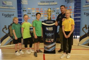 Bath Rugby head coach Mike Ford and youngsters with the Rugby World Cup