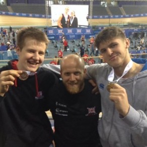 Coach Dan Harris (centre) with Marcus Whiteley and Jens Hullah, who won gold medals at the 2015 British Rowing Indoor Championships