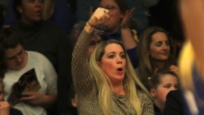 Anna Stembridge punches the air after a Team Bath Netball goal during the 2016 Superleague season