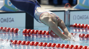 Kate French of Britain dives in to compete in the swimming portion of the women's modern pentathlon at the Summer Olympics in Rio de Janeiro, Brazil, Friday, Aug. 19, 2016. (AP Photo/Kirsty Wigglesworth)