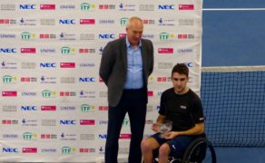 Quad singles winner Itay Erenlib receives the trophy from University of Bath Director of Sport Stephen Baddeley at the Bath Indoor Wheelchair Tennis Tournament, November 2016