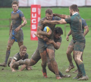 The University of Bath on the charge in a muddy BUCS Big Wednesday rugby league Trophy final against University of Nottingham