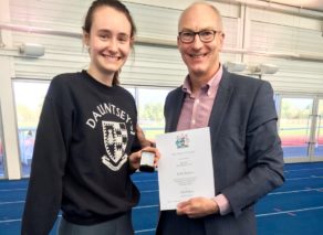 Polly Maton receives her Honorary Blue from University of Bath Director of Sport Stephen Baddeley