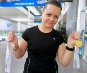 Invictus Games athlete Kelly Ganfield with her gold and silver medals from the 2017 British Rowing Indoor Championships