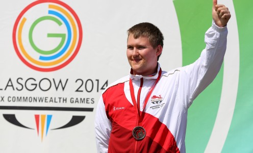 Kristian Callaghan recieves his bronze medal for the 25m rapid fire pistol at the 2014 Commonwealth Games - Day Six (Image: Press Association)