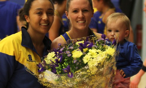 Asha Francis receives her player of the match flowers from Team Bath Netball Franchise Manager Alicia John