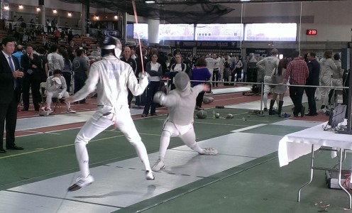 Fencer Noah Rogerson on the attack at the 2015 Boston Grand Prix, staged at Harvard University