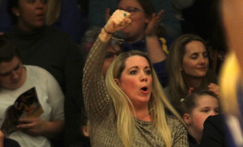 Anna Stembridge punches the air after a Team Bath Netball goal during the 2016 Superleague season