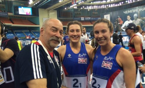 Women's relay silver medallists Joanna Muir and Samantha Murray with head coach Istvan Nemeth