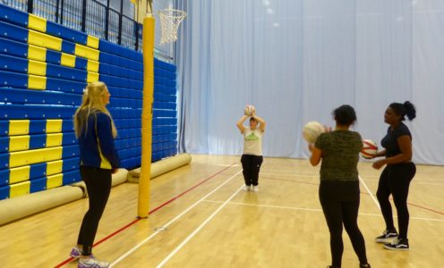 Team Bath Netball's Paige Reed and Chelsea Lewis with members of the Dame Kelly Holmes Trust Get On Track mentoring scheme, supported by Wesport and the 2nd Chance Group, November 2016