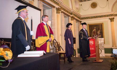 Bartu (second left) at Tuesday's degree ceremony