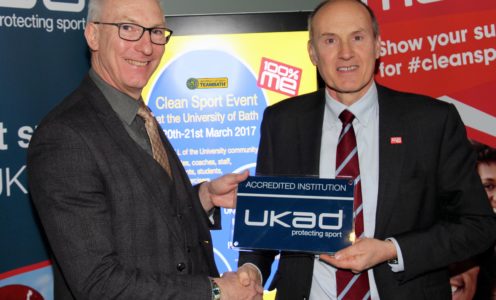 UKAD chairman Trevor Pearce (right) presents the accreditation plaque to University of Bath Director of Sport Stephen Baddeley