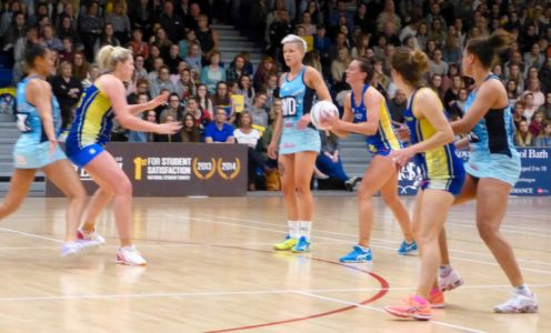 Rachel Shaw feeds Chelsea Lewis in Team Bath Netball's 59-33 win over Severn Stars, April 2017