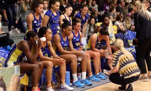 The Team Bath Netball squad being briefed by Anna Stembridge and Jess Thirlby during the 59-33 win over Severn Stars, April 2017