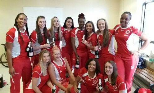 Picture of the England U21 netball squad celebrating their 2017 World Youth Cup bronze medal including Team Bath’s Imogen Allison (front, second from right) and Jess Shaw (back, third from right).