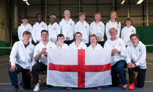 Picture of the England tennis team at the Four Nations’ Junior Championships including captain Rob Morgan (front, second from left), Tad Maclean (front left) and Louis Skupien (front right).