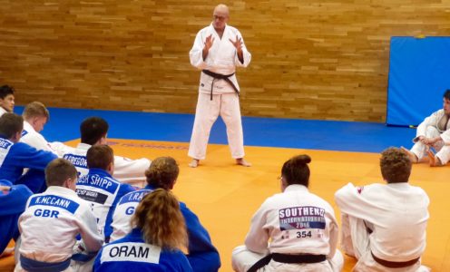 Juergen Klinger giving advice to AASE judoka during a training session in October 2017