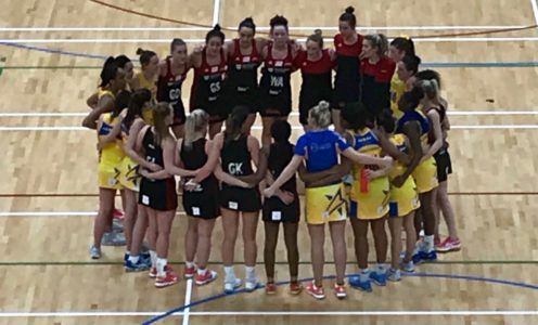 Team Northumbria and Team Bath players huddle after their opening match in the 2018 Superleague season