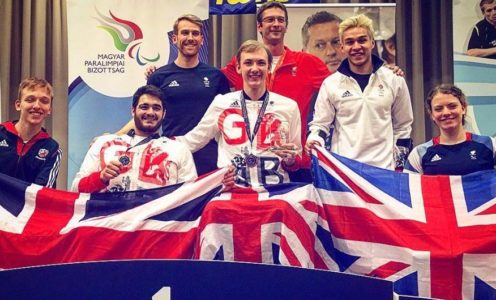 Wheelchair Fencing World Cup medallists Dimitri Coutya (front, second from left) and Piers Gilliver (front centre) with the GB team in Hungary