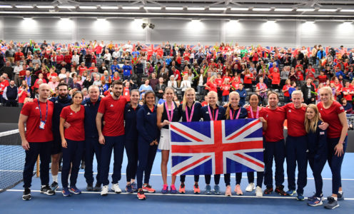 BATH, ENGLAND - FEBRUARY 09: The Great Britain side pose with a Union Jack after winning during Day Four of the Fed Cup Europe and Africa Zone Group I at the University of Bath on February 09, 2019 in Bath, England. (Photo by Harry Trump/Getty Images for LTA)