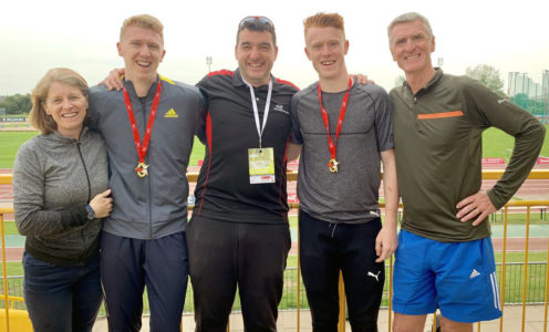 Cameron and Alistair Chalmers with coach James Hillier (centre) and their proud parents after both won gold at the England Athletics U23 & U20 Championships in June 2019