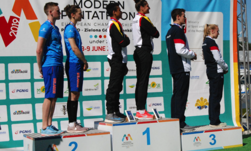 Georgia Hannam and Oliver Murray on the podium at the Junior Modern Pentathlon European Championships in June 2019