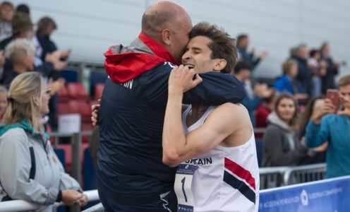 Jamie Cooke gets a hug after winning European Championships gold at the University of Bath in August 2019