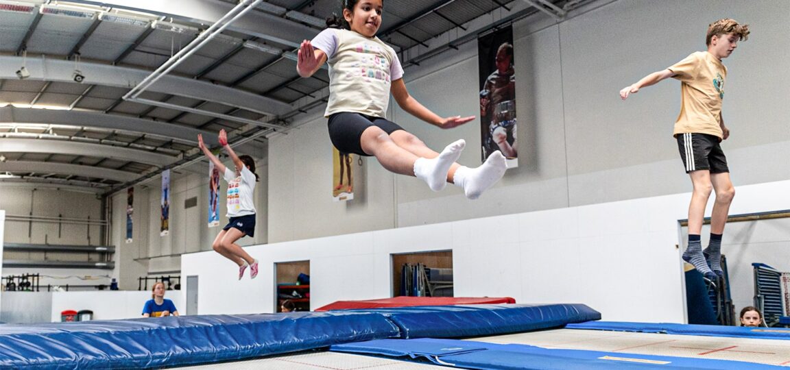 A picture of children enjoying a Team Bath Tribe trampolining class at the University of Bath