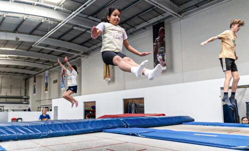 A picture of children enjoying a Team Bath Tribe trampolining class at the University of Bath