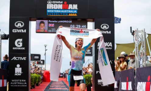 Fenella Langridge celebrates after winning the 2023 GWM IRONMAN Western Australia in a new course record time. PHOTO CREDIT: Korupt Vision