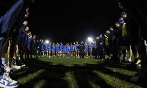 The University of Bath men's BUCS Super Rugby squad get a team talk.