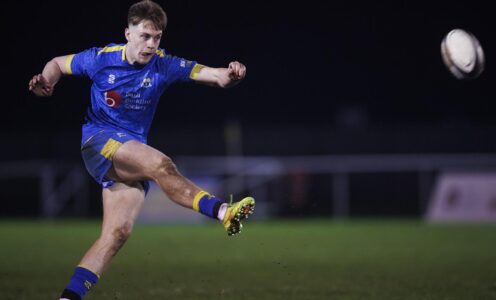 A picture of University of Bath men's 1st XV player Iwan Price-Thomas kicking a conversion in a BUCS Super Rugby fixture