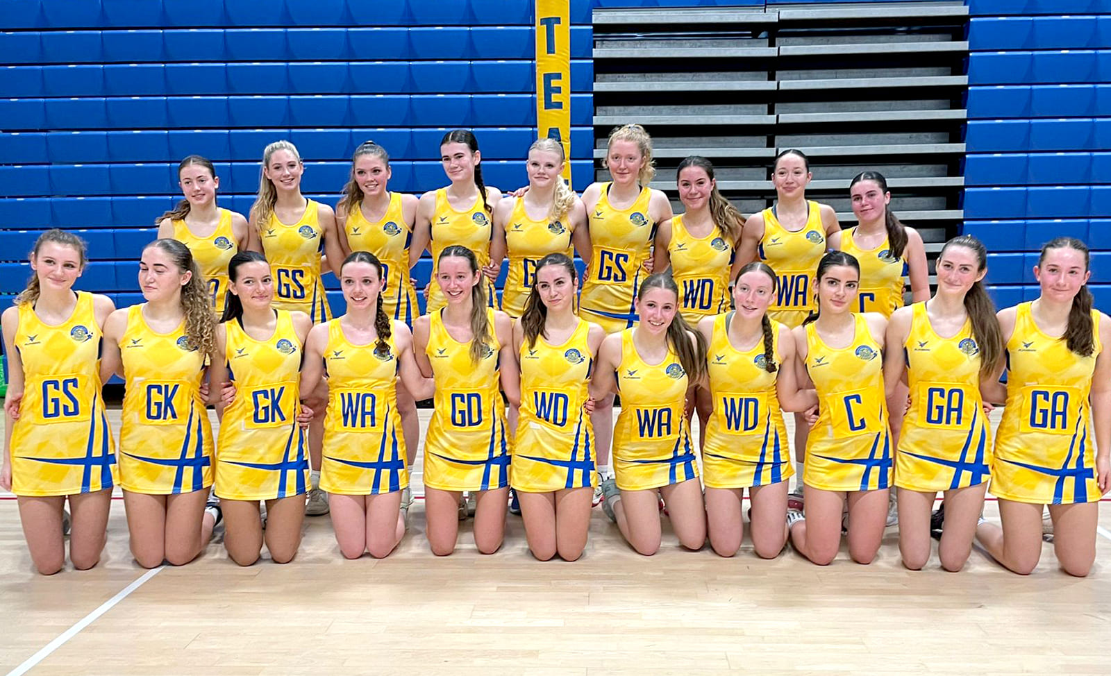 A picture of the Team Bath Netball Junior and Senior Performance Development Programme (PDP) 2024 squads at the University of Bath