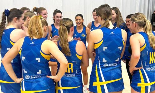 The Team Bath Netball U19 squad celebrate after beating Severn Stars in the 2024 NPL competition.