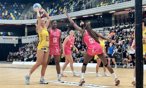 A picture of Sophie Kelly shooting for Team Bath Netball in their Super League match against London Pulse at the Copper Box Arena on Saturday 20th April 2024