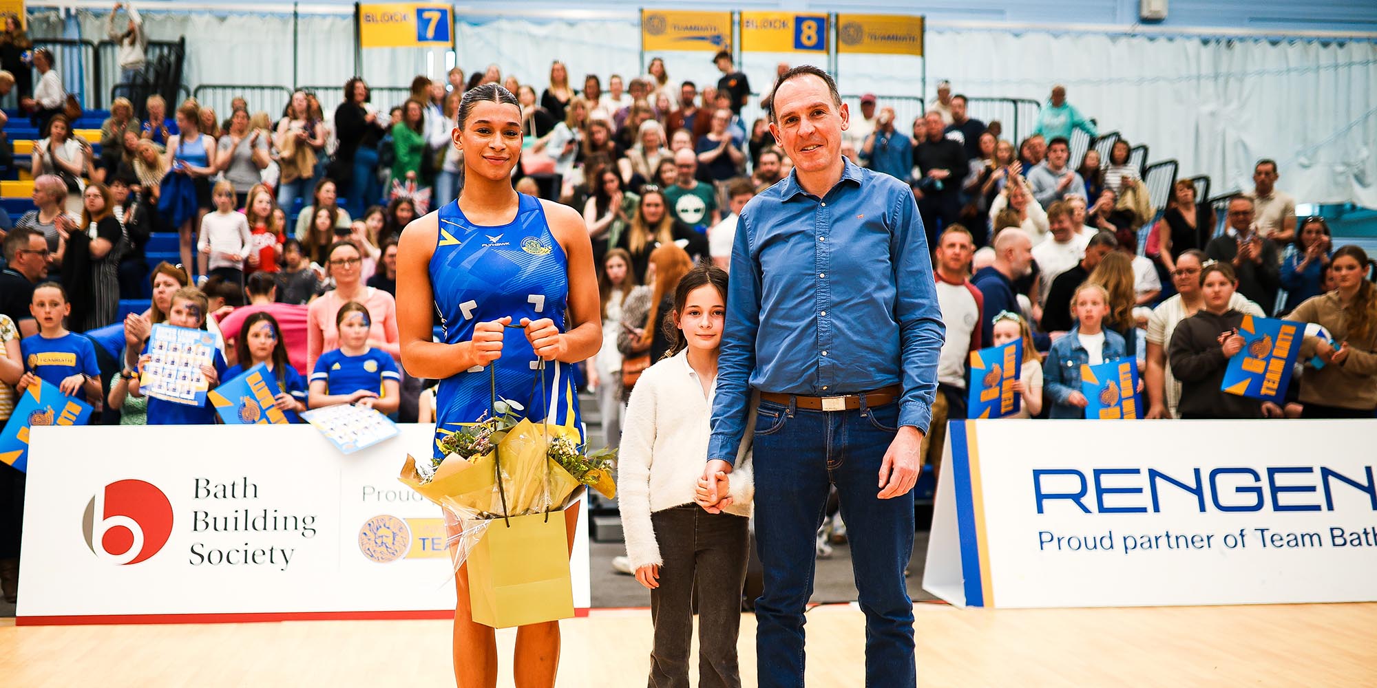 A picture of Vitality Roses defender Jayda Pechova being presented with the Team Bath Netball Fans' Most Valuable Player award by Richard Ingles, CEO of Bath Building Society, following the Super League match against Surrey Storm on 4th May 2024. CREDIT: Will Cooper/Fever Pitch.