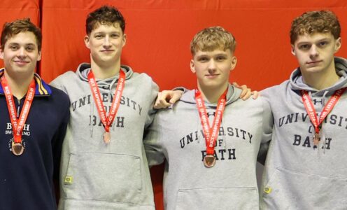 A photo of (from left) University of Bath student swimmers Matthew Ward, Cam Brooker, Joshua Gammon and Jack Skerry with the relay bronze medals they won at BUCS Nationals 2025. The photo was taken by Adam Bates for BUCS.