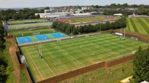 An aerial photo of the Team Bath Sports Training Village complex. The STV and outdoor athletics track are in the background with the 3G pitch, multi-use games area and 3G training strip in the foreground.