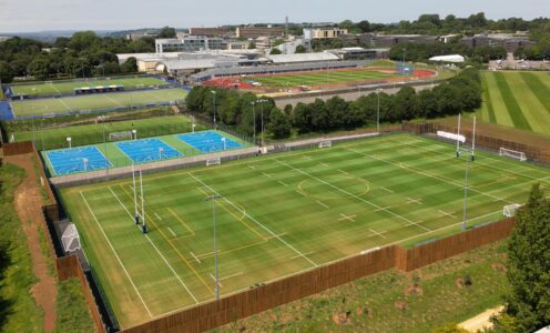 An aerial photo of the Team Bath Sports Training Village complex. The STV and outdoor athletics track are in the background with the 3G pitch, multi-use games area and 3G training strip in the foreground.