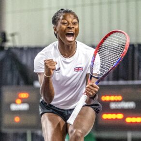 A photo of Team Bath Tennis player Esther Adeshina roaring with delight on court after winning a match for Great Britain Students at the 2024 Master'U BNP Paribas tournament in France.