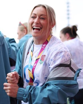England Rugby's Natasha Hunt with a big smile on her face and a gold medal around her neck during the celebrations of the Red Roses' 2025 Women's Rugby World Cup victory. 