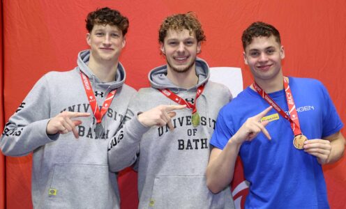 University of Bath swimmers (from left) Cam Brooker, Jack Skerry and Matt Ward with the 50m backstroke medals they won at BUCS Nationals 2026