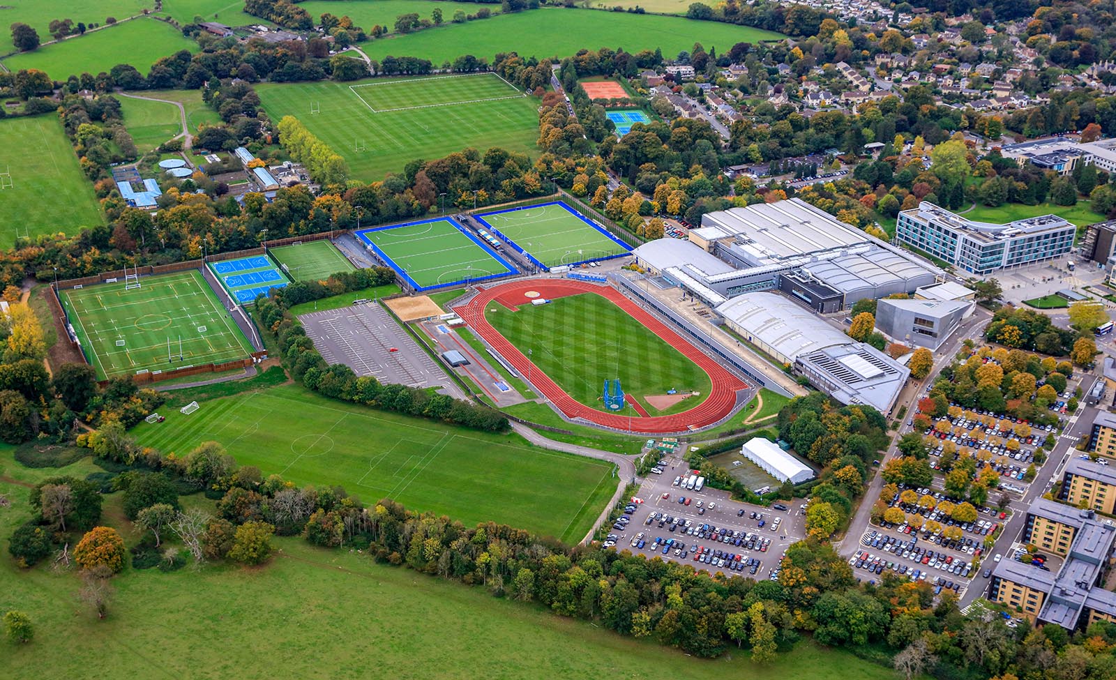 An aerial view of the Team Bath Sports Training Village plus adjacent athletics track and pitches