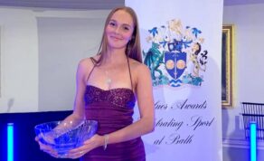 Sophie Kelly holding the University of Bath Sports Personality of the Year trophy