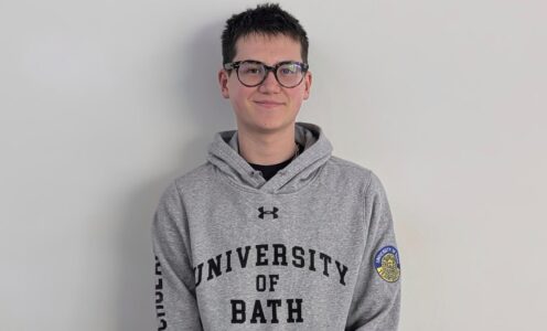 A profile picture of artistic swimmer Ranjuo Tomblin wearing a University of Bath hoodie