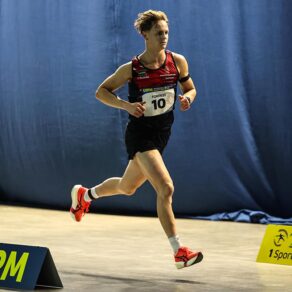 Pentathlon GB's Sebastian Forrest running on an indoor athletics track