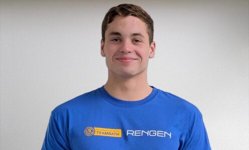A profile picture of University of Bath sporting scholar Matthew Ward (swimming) wearing a blue T-shirt featuring the Team Bath and Rengen logos.